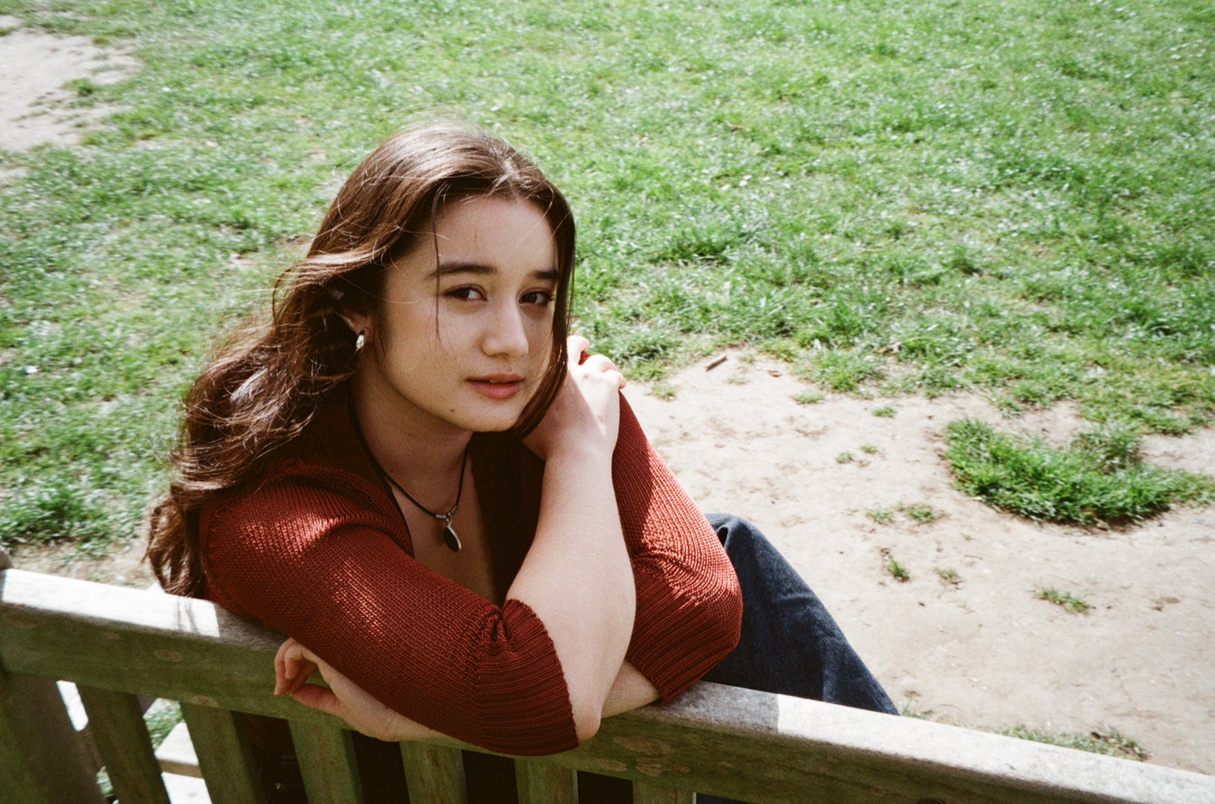 Clarissa Mae photographed from above near a green field